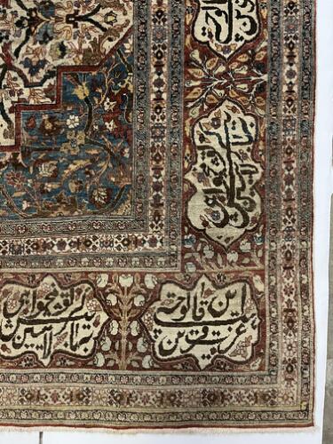 An antique Tabriz Haji Jalili carpet, Persia. Medallion design