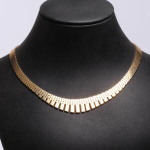 Halskæde af 14 kt. guld i forløb. L. 40 cm. Vægt 44 gr. Ca. 1960-70.