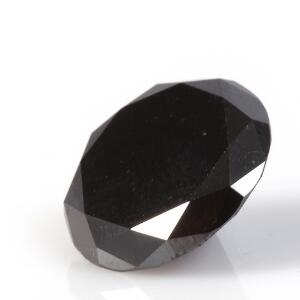 Uindfattet rund brillantsleben sort diamant på ca. 16.48 ct. Certifikat medfølger. 2012.