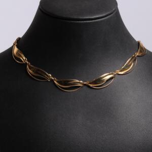 Halskæde af 14 kt. guld med bladformede led. L. ca. 37 cm. Vægt 13 g.