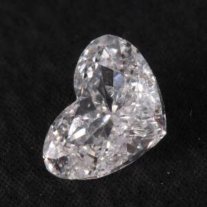 Uindfattet hjerteformet brillantslebet diamant på ca. 0.55 ct. Farve. River E. Klarhed. SI. Ca. 2011.