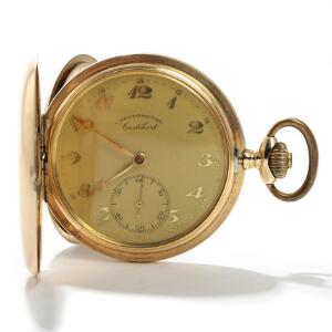 Dobbeltkapslet Chronometre Cortébert herrelommeur af 14 kt. guld, urskive med arabertal og separat sekundangivelse. Vægt ca. 97 gr. Diam. 52 mm.