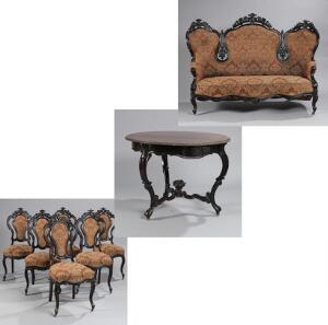 Nyrococo salon af palisander, prydet med udskæringer, bestående af rundt bord, sofa samt seks stole. Ca. 1860. 8