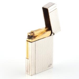 Dupont Lighter af delvis forgyldt stål. L. ca. 5,5 cm. Ca. 1995.