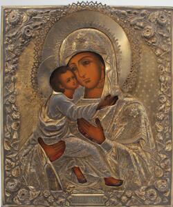 Russisk ikon forestillende Gudsmoderen med jesusbarnet dækket med oklad af sølv. Moskva 1867. Ca. 25 x 35.