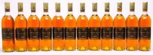 12 bts. Château Guiraud, Sauternes. 1. Cru Classé 1969 A-AB bn. Owc.