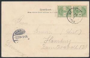 1900. Våben. 1 cent, grøn. Lodret parstykke på postkort til Tyskland, stemplet i ST. THOMAS 14.1.1904. Fint motiv af St. Thomas på bagsiden.