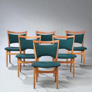 Finn Juhl Sæt på seks spisestole med stel af eg. Sæde samt ryg betrukket med sorttyrkis-nistret stof. Model 86. Formgivet 1953. 6