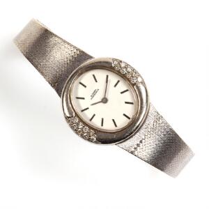 Girard-Perregaux Diamant damearmbåndsur af 14 kt. hvidguld. Mekanisk værk med manuelt optræk. 1970-80erne.