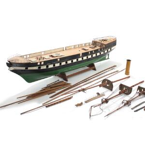 Fregatten Jylland. Modelskib af træ. Ikke færdiggjort model, hvor dele af rigning samt abejdstegninger medfølger. 1940-50erne. L. 112.