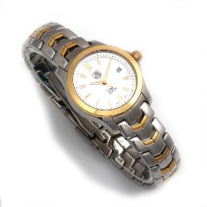 TAG Heuer Damearmbåndsur af stål og guldbelagt stål. Model Link, ref. WJF 1352.BB0581. Quartz med dato. Ca. 2011-12.