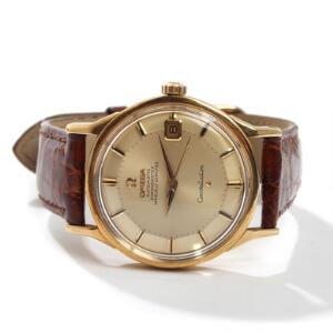 Omega Herrearmbåndsur af 18 kt. guld. Model Constellation. Chronometer certificeret automatisk værk med dato. Kassediam. 34 mm.