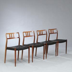 Niels O. Møller Et sæt på fire stole af palisander. Sæder betrukket med sort skind. Model 79. Formgivet 1966. Udført hos J. L. Møller. 4