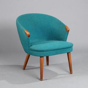Dansk design Lænestol med ben og håndtag af teaktræ, sæde, ryg og sider med turkies uld. 1950erne.