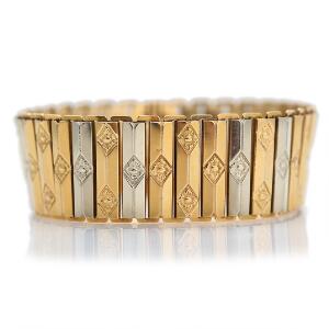 Armbånd af 18 kt. guld. L. 19,3 cm. Vægt 36,5 gr.