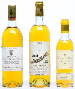1 bt. ½. Château dYquem, Sauternes. 1. Grand Cru Classé 1986 AB ts.  etc. Total 3 bts.
