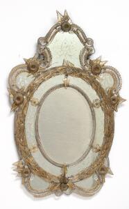 Venetiansk spejl, ramme besat med ornamenter af glas og slebet spejlglas. Italiensk barok form, 20. årh. H. 130. B. 85.