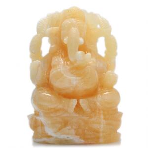 Ganesha figur udskåret af citrin. L. ca. 7 cm. H. ca. 10 cm. Vægt 500 gr.
