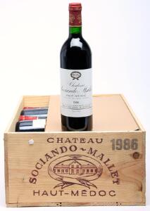 12 bts. Château Sociando-Mallet, Haut-Medoc 1986 A hfin. Owc.