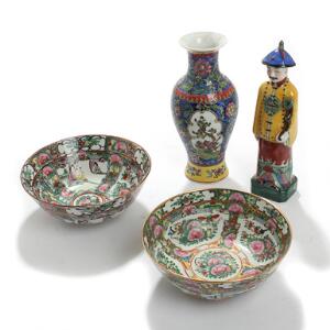 Orientalsk vase, figur og to skåle af porcelæn dekorerede med blomster, bladværk og figurscenerier i farver. 19.-20. årh. H. 8-27,5. 4