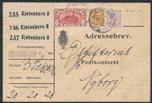 1912. 5 kr. Posthus, brunrød. Vm.III. samt Chr.X. 1 kr. gulbrun og 15 øre, matlilla. I alt 6,15 kr. frankering på adressebrev til Nyborg, stemplet KJØBENHAVN 1.