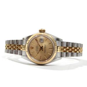 Rolex Damearmbåndsur af guld og stål. Model Oyster Perpetual DateJust. Chronometer certificeret automatisk værk med dato. Kassediam. ca. 26 mm. 1989.