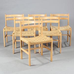 Bernt Sæt på seks stole med stel af egetræ, sæder udspændt med fransk flet. Samt spisebord med massiv plade af egetræ. H. 70. L. 142250. 9