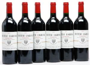 12 bts. Château Lagrange, Pomerol 2001 A hfin. Owc.