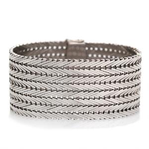 Armbånd af 14 kt. hvidguld. L. ca. 17 cm. B. ca. 3 cm. Vægt. 66,5 g.
