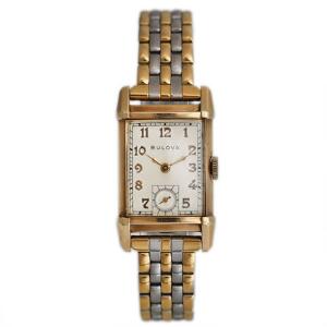 Bulova Damearmbåndsur af guldbelagt stål. Mekanisk værk med manuelt optræk. 1930-40erne.