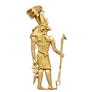 Vedhæng af 18 kt. guld i form af den ægyptiske gudHorus. L. ca. 5,3 cm.