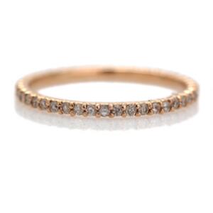 Diamantalliancering af 14 kt. pink guld prydet med talrige brillantslebne diamanter. Str. 55.