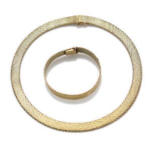 Halskæde og armbånd af 14 kt. guld. L. 42 og 19 cm. Vægt i alt ca. 125 gr. Ca. 1960-70.