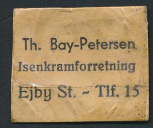 FRIMÆRKEPENGE. Th. Bay-Petersen Isenkramforretning. Ejby St. - Tlf. 15. 5 øre. Sjælden Frimærkepenge.