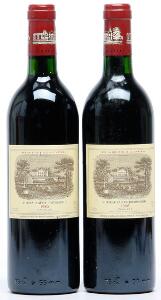 2 bts. Château Lafite Rothschild, Pauillac. 1. Cru Classé 1986 A-AB bn.