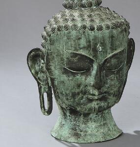 Buddha hoved af metal. H. 65.