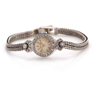 Tissot Diamant damearmbåndsur af 14 kt. hvidguld. Mekanisk værk med manuelt optræk. 1950s.