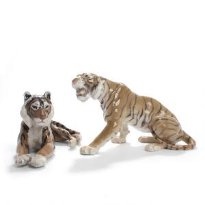 Lauritz Jensen Snerrende tiger og ligggende tiger. To figurer af porcelæn, BG og Kgl. P. Nr. 1712 og 714. H. 17 og 13. 2