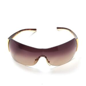 Prada Et par solbriller med brunt glas og brune og forgyldte stænger. Original æske medfølger.