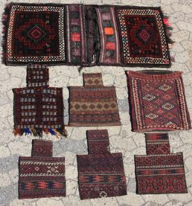 Syv nomade tekstiler. Belouch dobbelt sadeltaske, fem Belouchafghan salttasker samt Kurdisk opbevaringspose. Alle 1940-1980.7