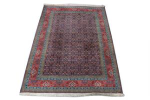 Tabriz t tæppe, Persien. Gentagelsesmønster med heratimønster på blå bund. 20. årh.s anden halvdel. 345 x 244.
