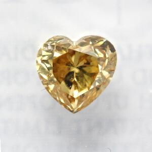 Uindfattet hjerteformet brillantslebet diamant på ca. 0.71 ct. Farve Fancy Deep Brownish Yellow. GIA certifikat nr. 2145604811 medfølger. Antwerpen 2013.