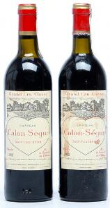 2 bts. Château Calon Ségur, Saint - Estephe. 3. Cru Classé 1982 AB ts.