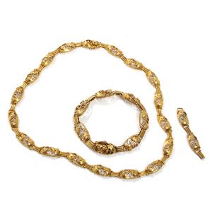 Viggo Wollny, Franz Hingelberg Gennembrudt armbånd og halskæde af 14 kt. guld. Vægt i alt 40,6 gr. L. 18,7 og 43,2. 2