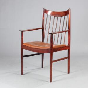 Helge Sibast Armstol af palisander, sæde betrukket med cognacfarvet skind. Model 423. Udført hos Sibast Furniture.