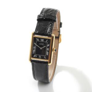 Cartier Damearmbåndsur af forgyldt sterlingsølv. Model Tank Must de Cartier. Kassediam. ca. 23 mm. Certifikat og original æske medfølger. 1986.