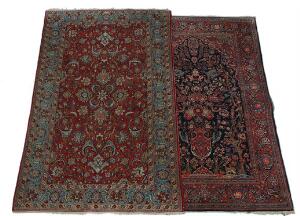 To persiske tæpper. Keshan tæppe. Nichedesign på blå bund. 131 x 200. Qum tæppe. Blomster og bladværk på rød bund. 131 x 210. Begge Ca. 1960.2
