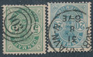1882. 5 øre, grøn og 20 øre blå, små tal. Begge mærker med OMVENDTE VANDMÆRKER. AFA 1900.
