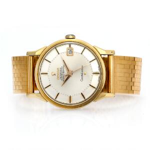 Omega Herrearmbåndsur af guldbelagt stål. Model Constellation. Chronometer certificeret automatisk værk med dato. 1960erne.