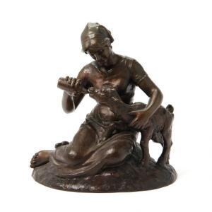 Lauritz Jensen Figur af patineret bronze forestillende pige der fodrer lam. Sign. Lauritz Jensen. H. 27 cm.